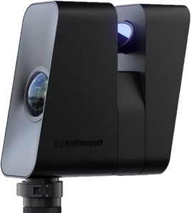 a black camera with a blue light